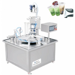 Rotary filling and sealing machine